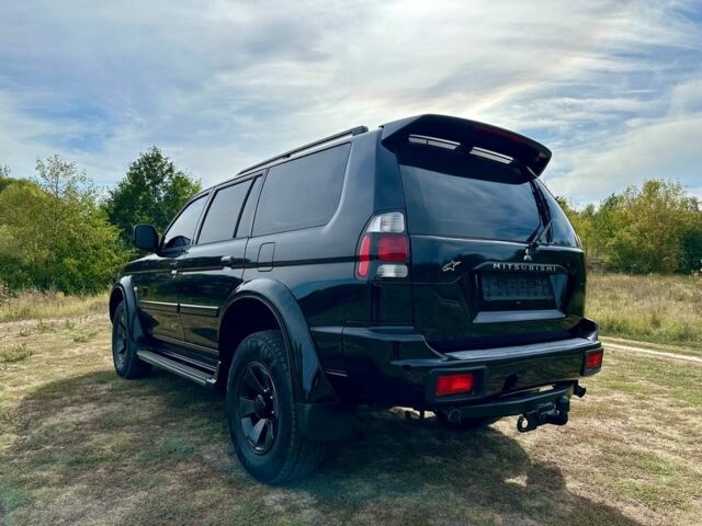 Черный Мицубиси Паджеро Спорт, объемом двигателя 3 л и пробегом 250 тыс. км за 8300 $, фото 5 на Automoto.ua
