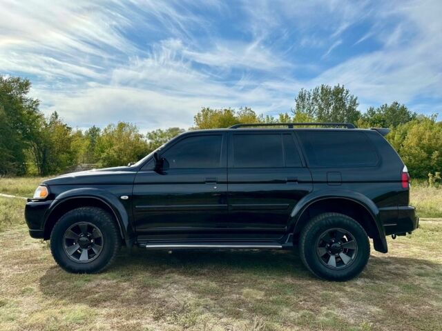 Черный Мицубиси Паджеро Спорт, объемом двигателя 3 л и пробегом 250 тыс. км за 8300 $, фото 4 на Automoto.ua