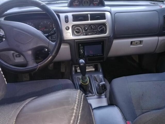 Черный Мицубиси Паджеро Спорт, объемом двигателя 2.5 л и пробегом 239 тыс. км за 2950 $, фото 6 на Automoto.ua