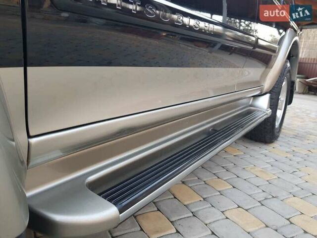 Черный Мицубиси Паджеро Спорт, объемом двигателя 3 л и пробегом 176 тыс. км за 8950 $, фото 18 на Automoto.ua