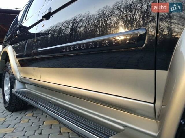 Черный Мицубиси Паджеро Спорт, объемом двигателя 3 л и пробегом 176 тыс. км за 8950 $, фото 23 на Automoto.ua