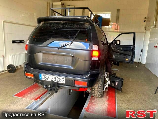 Черный Мицубиси Паджеро Спорт, объемом двигателя 3 л и пробегом 100 тыс. км за 4500 $, фото 3 на Automoto.ua