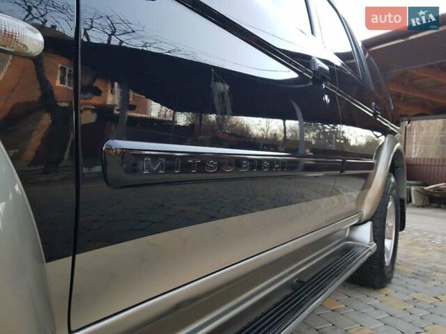 Черный Мицубиси Паджеро Спорт, объемом двигателя 3 л и пробегом 176 тыс. км за 8950 $, фото 26 на Automoto.ua
