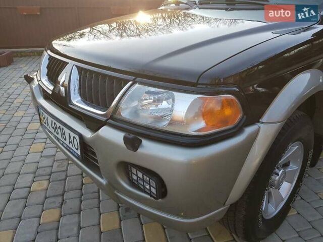 Черный Мицубиси Паджеро Спорт, объемом двигателя 3 л и пробегом 176 тыс. км за 8950 $, фото 1 на Automoto.ua