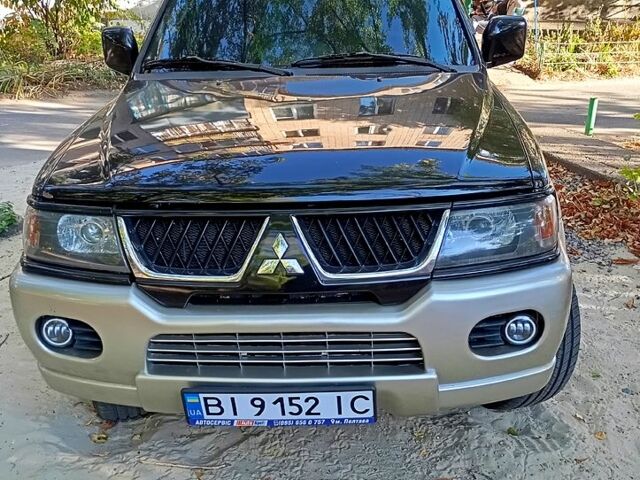 Чорний Міцубісі Паджеро Спорт, об'ємом двигуна 3 л та пробігом 180 тис. км за 8200 $, фото 2 на Automoto.ua