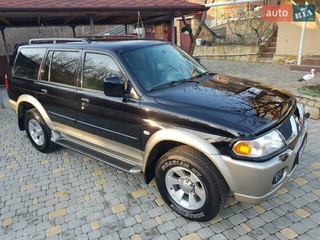 Черный Мицубиси Паджеро Спорт, объемом двигателя 3 л и пробегом 176 тыс. км за 8950 $, фото 3 на Automoto.ua