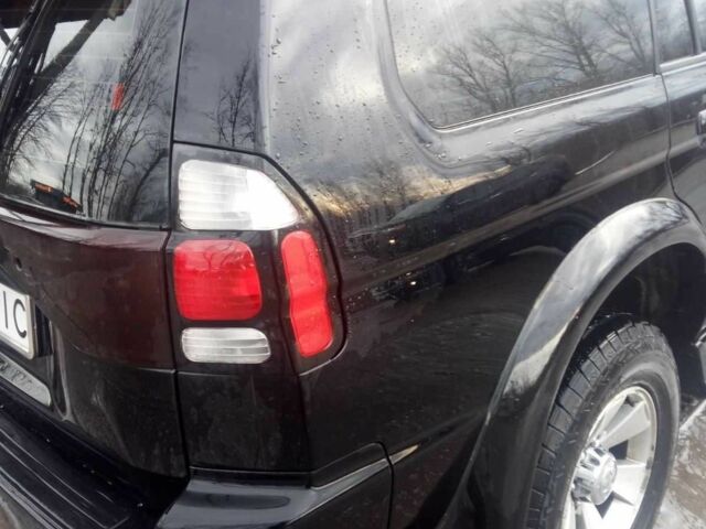 Чорний Міцубісі Паджеро Спорт, об'ємом двигуна 2.5 л та пробігом 209 тис. км за 8300 $, фото 4 на Automoto.ua