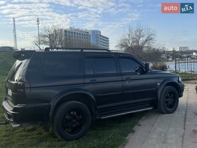 Черный Мицубиси Паджеро Спорт, объемом двигателя 3 л и пробегом 239 тыс. км за 9900 $, фото 10 на Automoto.ua