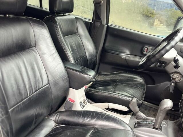 Чорний Міцубісі Паджеро Спорт, об'ємом двигуна 3 л та пробігом 200 тис. км за 5500 $, фото 9 на Automoto.ua