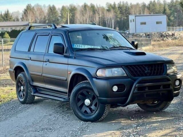 Черный Мицубиси Паджеро Спорт, объемом двигателя 2.5 л и пробегом 239 тыс. км за 2950 $, фото 1 на Automoto.ua