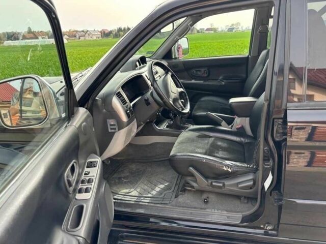 Чорний Міцубісі Паджеро Спорт, об'ємом двигуна 2.5 л та пробігом 308 тис. км за 4800 $, фото 7 на Automoto.ua