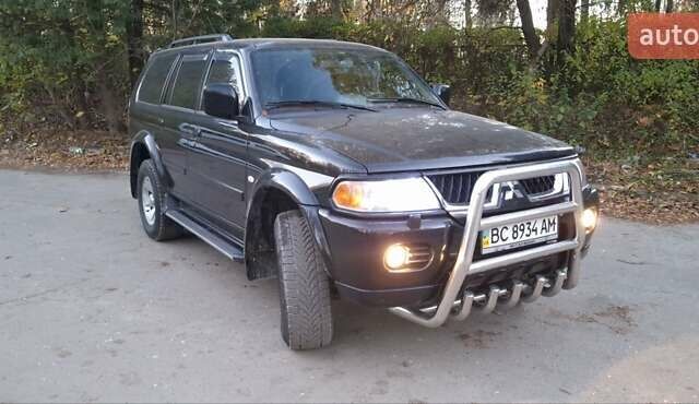 Чорний Міцубісі Паджеро Спорт, об'ємом двигуна 2.97 л та пробігом 215 тис. км за 7500 $, фото 20 на Automoto.ua