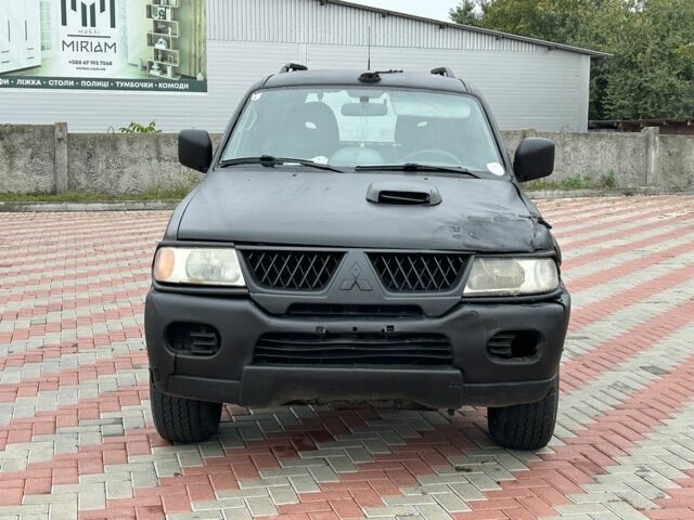 Чорний Міцубісі Паджеро Спорт, об'ємом двигуна 2.5 л та пробігом 220 тис. км за 2750 $, фото 7 на Automoto.ua