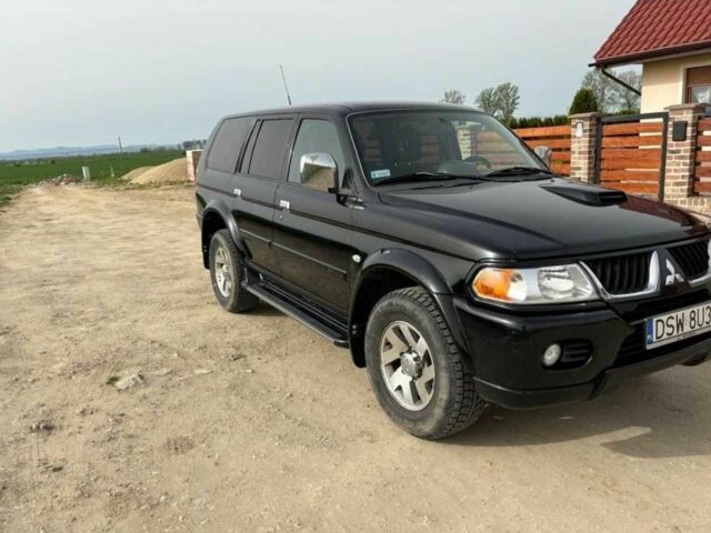 Чорний Міцубісі Паджеро Спорт, об'ємом двигуна 2.5 л та пробігом 308 тис. км за 4800 $, фото 1 на Automoto.ua