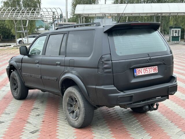 Чорний Міцубісі Паджеро Спорт, об'ємом двигуна 2.5 л та пробігом 220 тис. км за 2750 $, фото 2 на Automoto.ua
