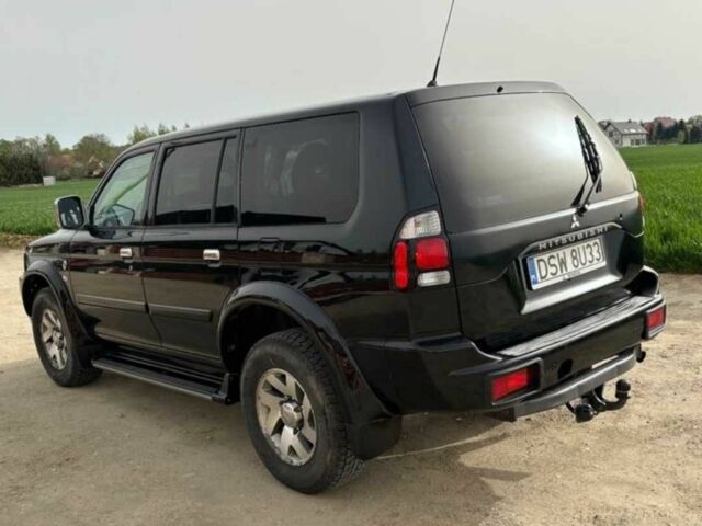 Чорний Міцубісі Паджеро Спорт, об'ємом двигуна 2.5 л та пробігом 308 тис. км за 4800 $, фото 4 на Automoto.ua