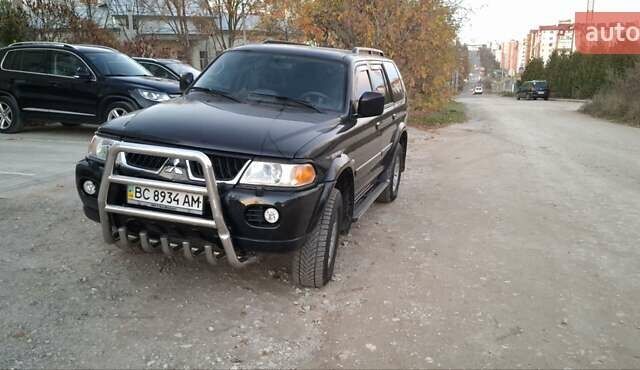 Чорний Міцубісі Паджеро Спорт, об'ємом двигуна 2.97 л та пробігом 215 тис. км за 7500 $, фото 2 на Automoto.ua