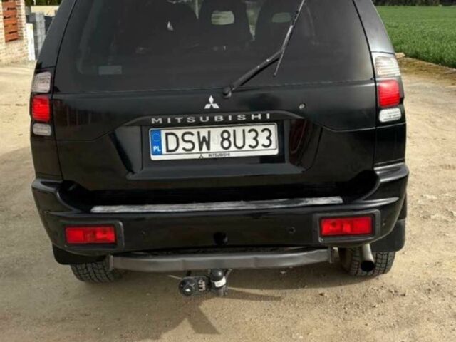 Чорний Міцубісі Паджеро Спорт, об'ємом двигуна 2.5 л та пробігом 308 тис. км за 4800 $, фото 5 на Automoto.ua