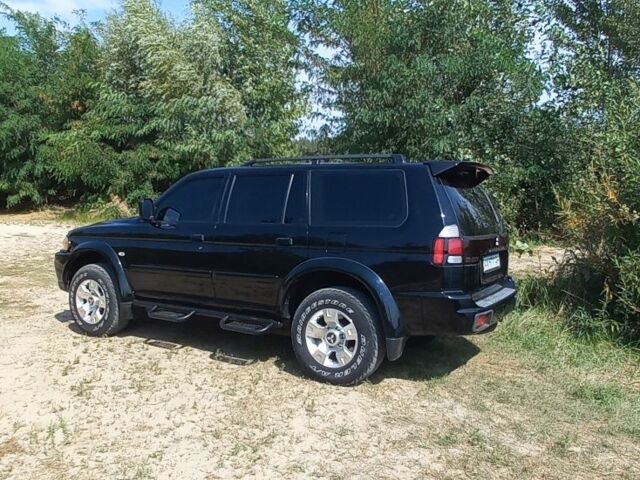 Чорний Міцубісі Паджеро Спорт, об'ємом двигуна 0 л та пробігом 150 тис. км за 9000 $, фото 5 на Automoto.ua