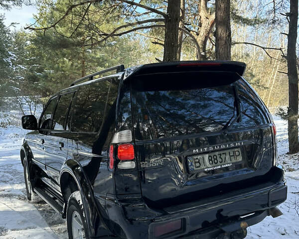 Черный Мицубиси Паджеро Спорт, объемом двигателя 3 л и пробегом 292 тыс. км за 8500 $, фото 9 на Automoto.ua