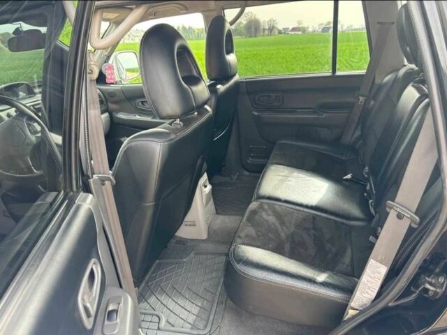 Чорний Міцубісі Паджеро Спорт, об'ємом двигуна 2.5 л та пробігом 308 тис. км за 4800 $, фото 9 на Automoto.ua