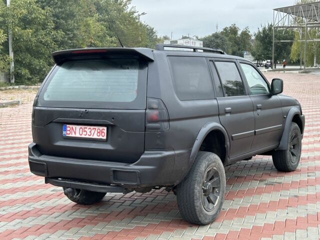 Чорний Міцубісі Паджеро Спорт, об'ємом двигуна 2.5 л та пробігом 220 тис. км за 2750 $, фото 4 на Automoto.ua