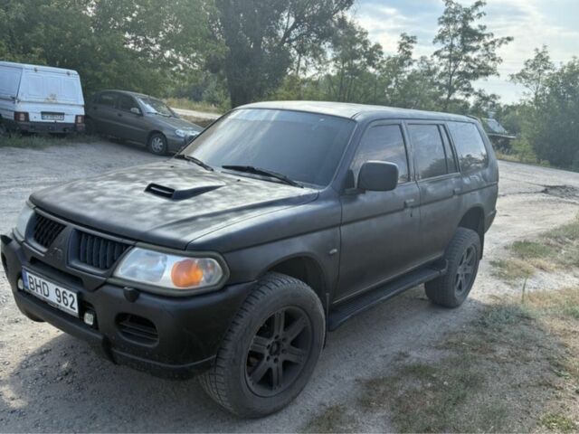 Черный Мицубиси Паджеро Спорт, объемом двигателя 2.5 л и пробегом 400 тыс. км за 4276 $, фото 2 на Automoto.ua