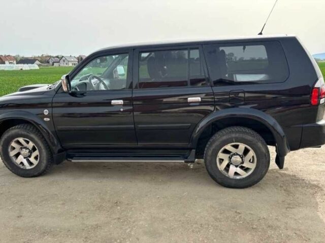 Чорний Міцубісі Паджеро Спорт, об'ємом двигуна 2.5 л та пробігом 308 тис. км за 4800 $, фото 6 на Automoto.ua