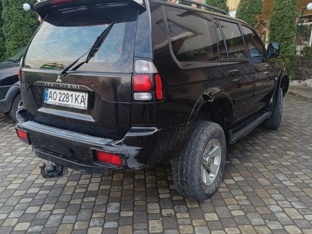 Чорний Міцубісі Паджеро Спорт, об'ємом двигуна 2.5 л та пробігом 275 тис. км за 9300 $, фото 2 на Automoto.ua