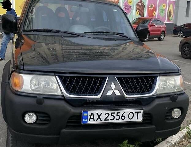 Черный Мицубиси Паджеро Спорт, объемом двигателя 3 л и пробегом 272 тыс. км за 7500 $, фото 1 на Automoto.ua