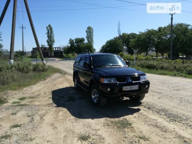 Чорний Міцубісі Паджеро Спорт, об'ємом двигуна 2.97 л та пробігом 250 тис. км за 10000 $, фото 4 на Automoto.ua