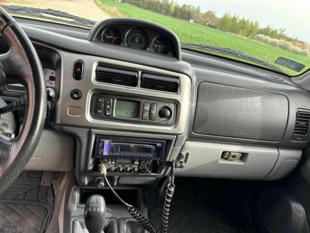 Чорний Міцубісі Паджеро Спорт, об'ємом двигуна 2.5 л та пробігом 308 тис. км за 4800 $, фото 8 на Automoto.ua