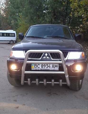Чорний Міцубісі Паджеро Спорт, об'ємом двигуна 2.97 л та пробігом 215 тис. км за 7500 $, фото 9 на Automoto.ua