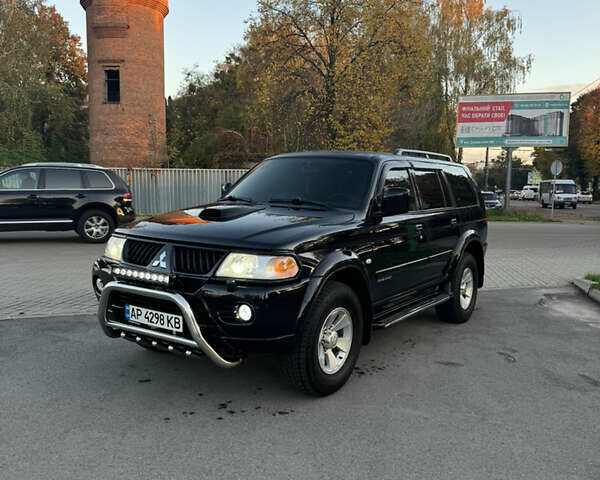 Черный Мицубиси Паджеро Спорт, объемом двигателя 2.97 л и пробегом 260 тыс. км за 7777 $, фото 2 на Automoto.ua