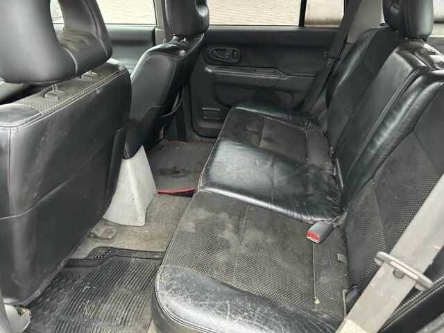 Чорний Міцубісі Паджеро Спорт, об'ємом двигуна 2.5 л та пробігом 220 тис. км за 2750 $, фото 9 на Automoto.ua