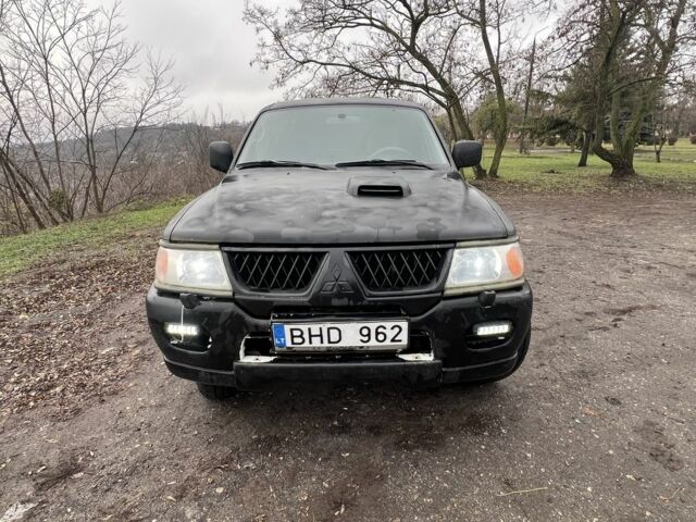 Чорний Міцубісі Паджеро Спорт, об'ємом двигуна 2.5 л та пробігом 402 тис. км за 4200 $, фото 1 на Automoto.ua