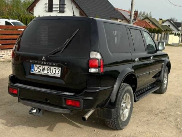 Чорний Міцубісі Паджеро Спорт, об'ємом двигуна 2.5 л та пробігом 308 тис. км за 4800 $, фото 3 на Automoto.ua