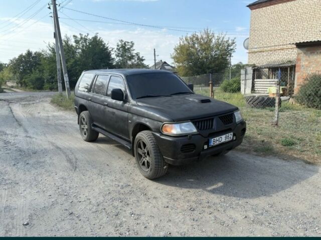 Черный Мицубиси Паджеро Спорт, объемом двигателя 2.5 л и пробегом 400 тыс. км за 4276 $, фото 3 на Automoto.ua