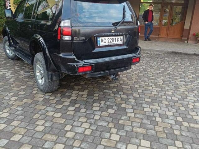 Чорний Міцубісі Паджеро Спорт, об'ємом двигуна 2.5 л та пробігом 275 тис. км за 9300 $, фото 1 на Automoto.ua