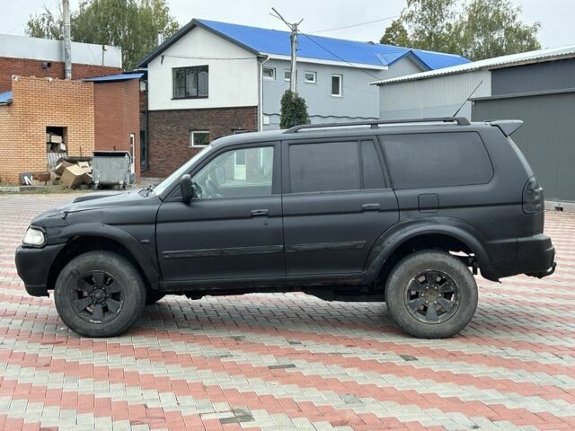 Чорний Міцубісі Паджеро Спорт, об'ємом двигуна 2.5 л та пробігом 220 тис. км за 2750 $, фото 1 на Automoto.ua
