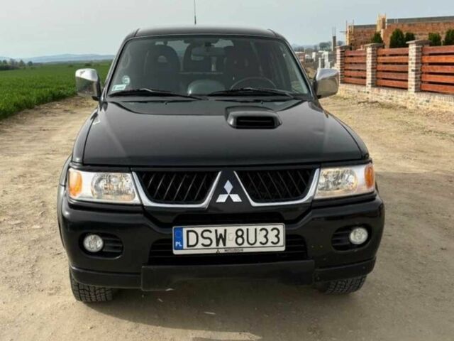Чорний Міцубісі Паджеро Спорт, об'ємом двигуна 2.5 л та пробігом 308 тис. км за 4800 $, фото 2 на Automoto.ua