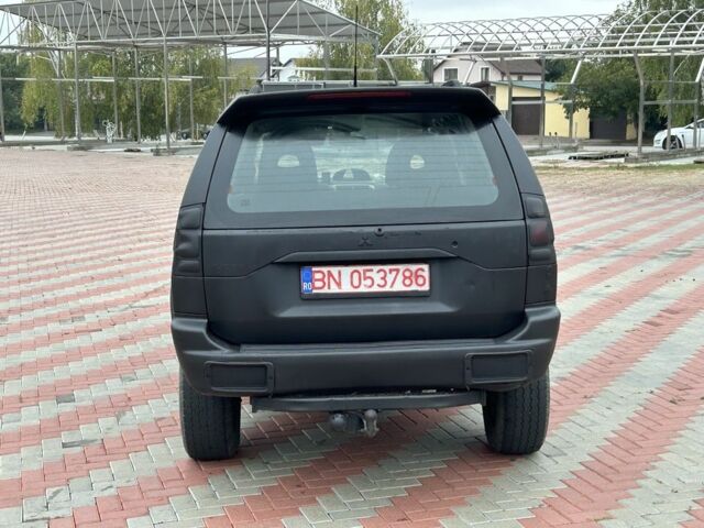 Чорний Міцубісі Паджеро Спорт, об'ємом двигуна 2.5 л та пробігом 220 тис. км за 2750 $, фото 3 на Automoto.ua