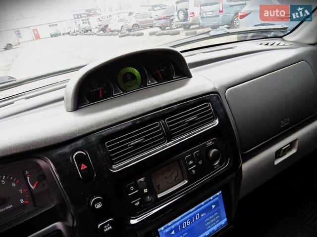 Чорний Міцубісі Паджеро Спорт, об'ємом двигуна 2.97 л та пробігом 181 тис. км за 8500 $, фото 11 на Automoto.ua