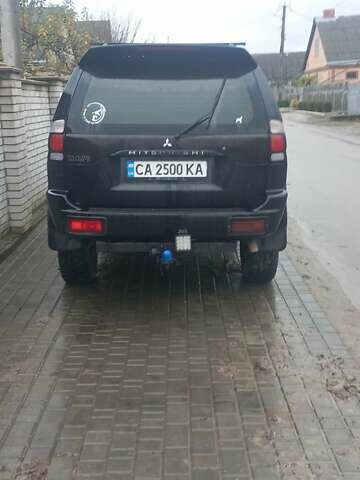 Черный Мицубиси Паджеро Спорт, объемом двигателя 2.5 л и пробегом 220 тыс. км за 10200 $, фото 2 на Automoto.ua