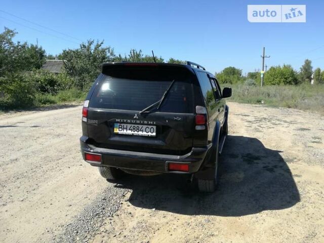 Чорний Міцубісі Паджеро Спорт, об'ємом двигуна 2.97 л та пробігом 250 тис. км за 10000 $, фото 5 на Automoto.ua