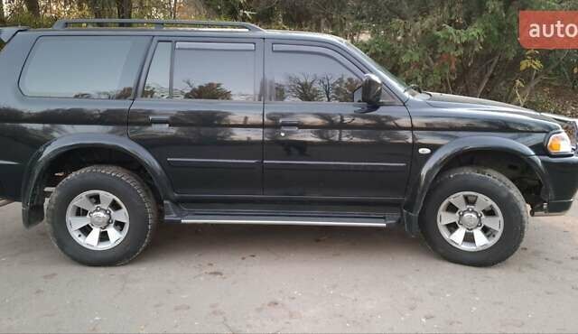 Чорний Міцубісі Паджеро Спорт, об'ємом двигуна 2.97 л та пробігом 215 тис. км за 7500 $, фото 19 на Automoto.ua
