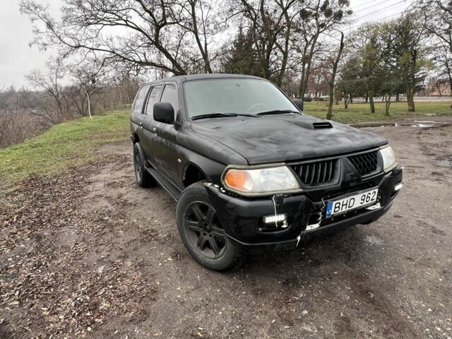 Чорний Міцубісі Паджеро Спорт, об'ємом двигуна 2.5 л та пробігом 402 тис. км за 4200 $, фото 2 на Automoto.ua