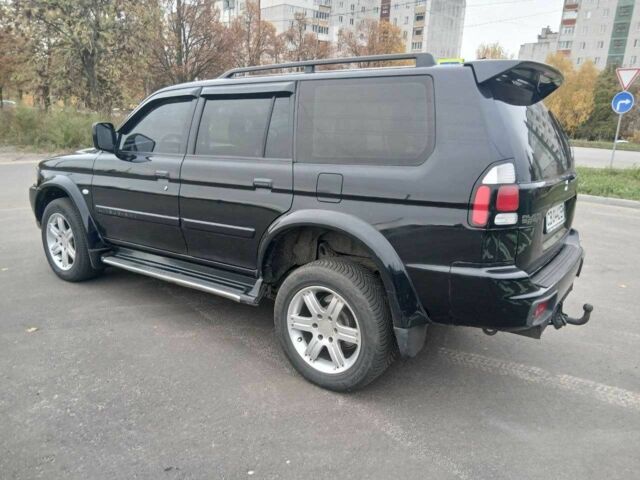 Чорний Міцубісі Паджеро Спорт, об'ємом двигуна 3 л та пробігом 200 тис. км за 8300 $, фото 4 на Automoto.ua