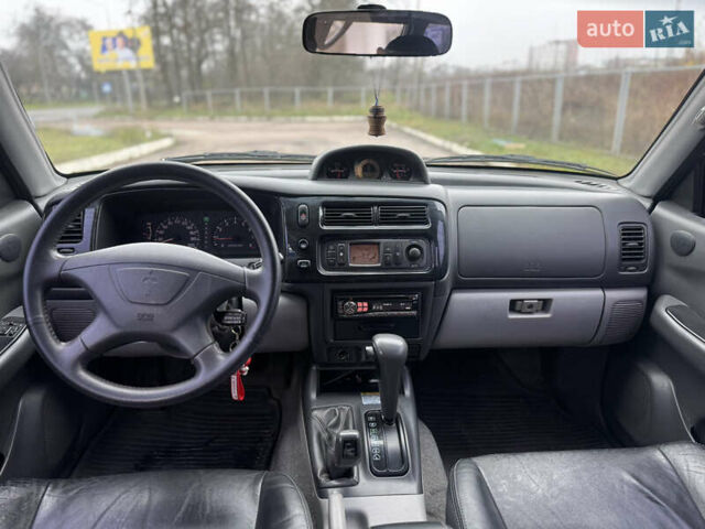 Черный Мицубиси Паджеро Спорт, объемом двигателя 3 л и пробегом 240 тыс. км за 8500 $, фото 7 на Automoto.ua