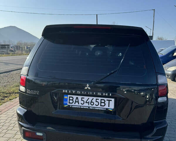 Черный Мицубиси Паджеро Спорт, объемом двигателя 2.48 л и пробегом 163 тыс. км за 10500 $, фото 4 на Automoto.ua